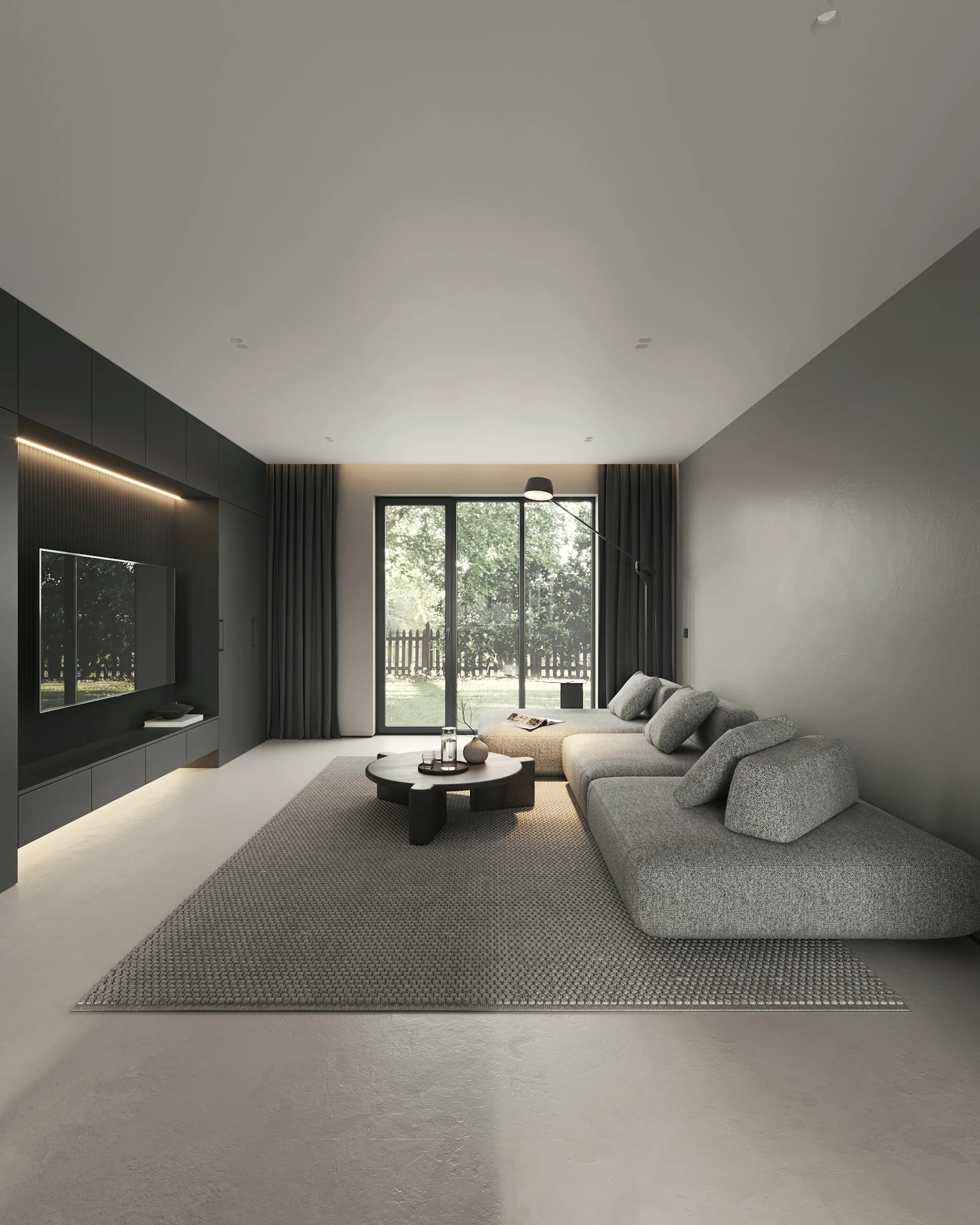 An open plan interior in low light, the ceiling plane running unbroken to the glazing.