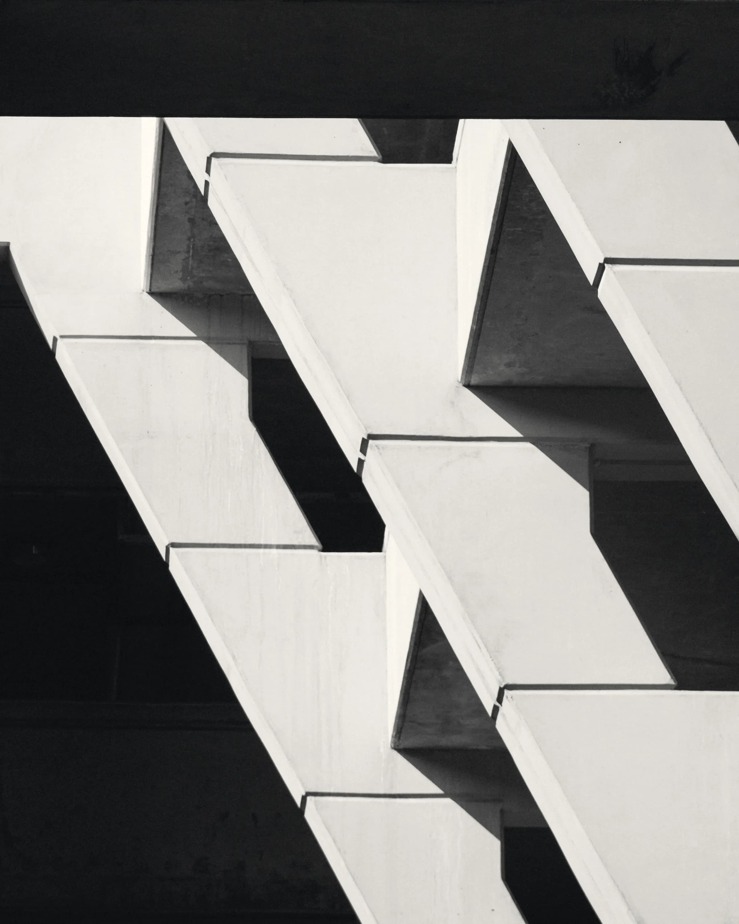 A close view of a fin facade, the sections reading as one continuous texture.